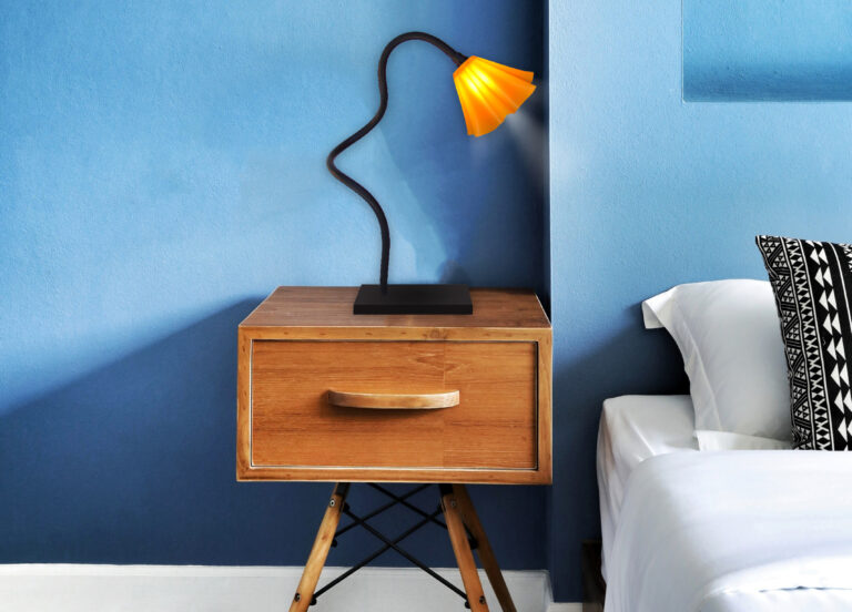 A vertical shot of modern bedroom interior design in blue tones