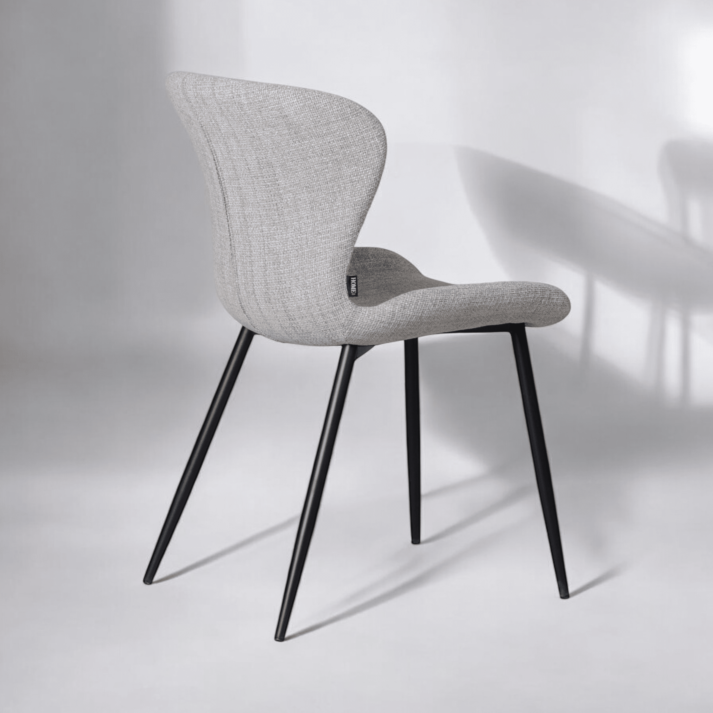 כסא טיפאני אריג אפור רגל שחורה דגם קליי כסא טיפאני אריג אפור רגל שחורה דגם קליי