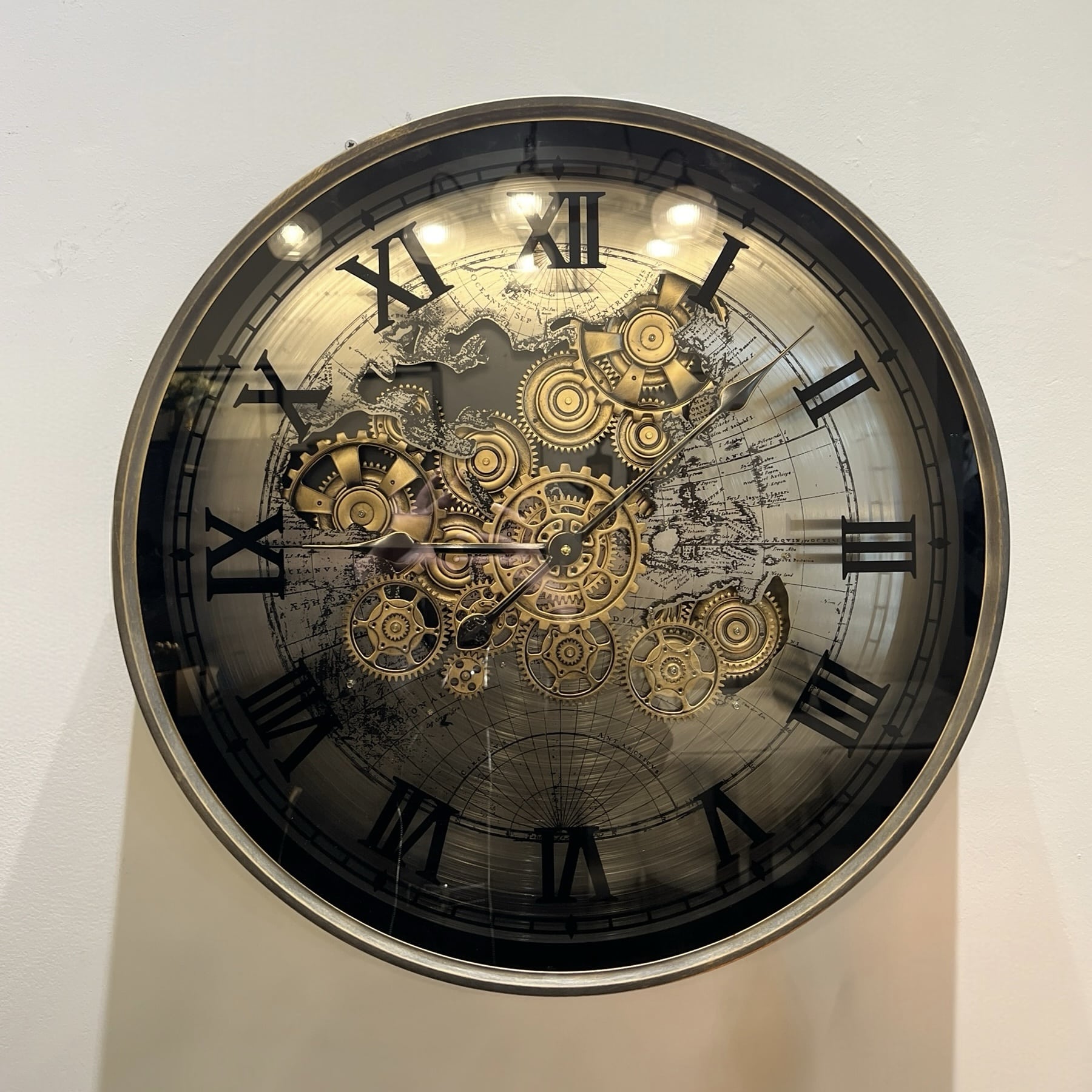 שעון ברזל מושחר זכוכית גלגלי שיניים זהב מספרים רומיים 60ס״מ דגם איקו שעון ברזל מושחר זכוכית גלגלי שיניים זהב מספרים רומיים 60ס״מ דגם איקו